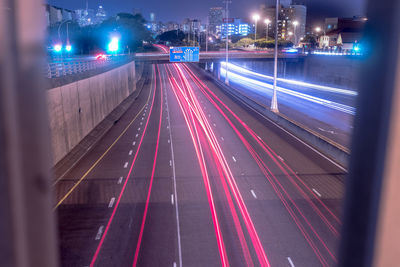 High angle view of light trails on city street