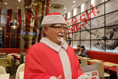 Close-up of santa statue at restaurant