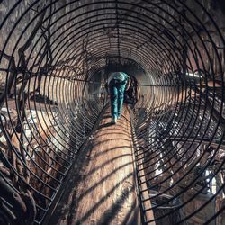 One person in a spooky tunnel