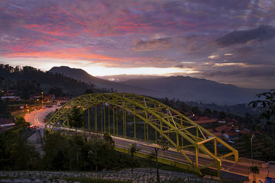 Scenic view of mountains against orange sky