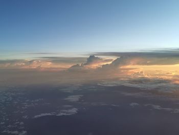 Aerial view of cloudscape against sky during sunset