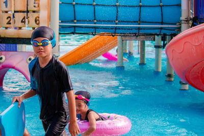 Boy enjoying in swimming pool