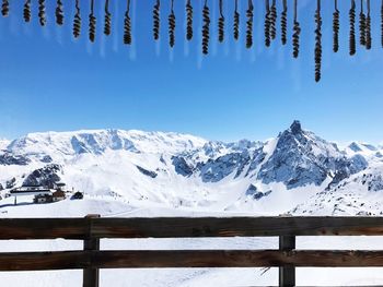 Scenic view of snow mountains against sky