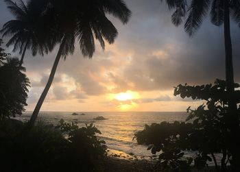 Scenic view of sea against sky at sunset