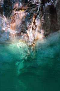 Close-up of rock formation in sea