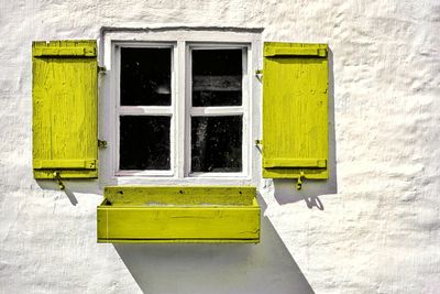 Close-up of yellow window