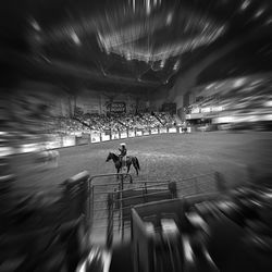 Blurred motion of woman at night