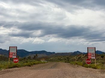 Road signs against sky