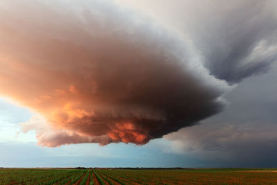 A dramatic supercell thunderstorm at sunset near earth, texas, usa