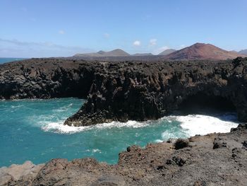 Scenic view of sea and mountains