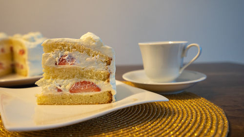 Close-up of coffee served on table