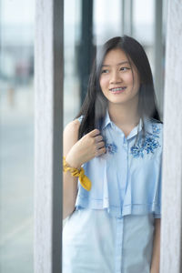 Portrait of a smiling young woman