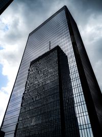 Low angle view of modern building against sky