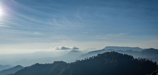 Scenic view of mountains against sky at night