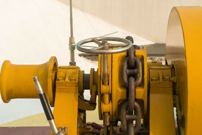 Yellow machine part in factory