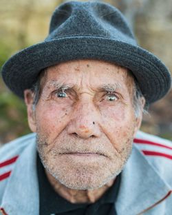 Close-up portrait of man wearing hat