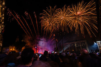 Firework display at night