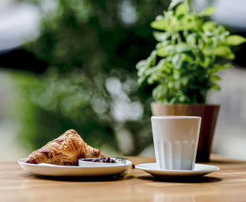 Close-up of coffee cup on table