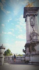 Silhouette of woman against clear sky