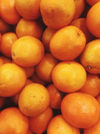 Full frame shot of oranges for sale at market stall