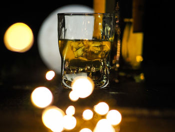 Close-up of beer glass on table