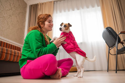 Portrait of woman with dog