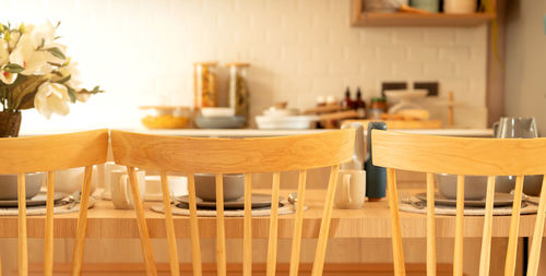 Empty chairs and table in restaurant