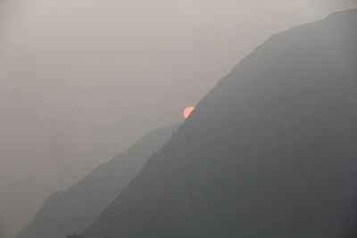 Scenic view of mountains against clear sky