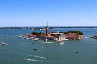 High angle view of sea against blue sky