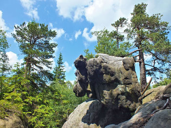 Low angle view of statue against sky