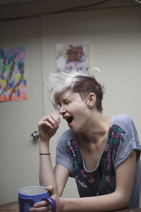 Young woman hanging out in her apartment