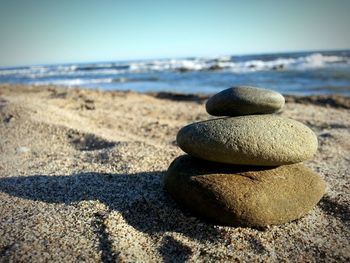 Close-up of stones on beach