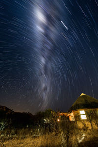 Scenic view of star field against sky at night