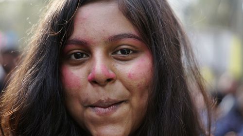 Close-up portrait of young woman