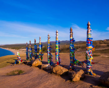 Panoramic shot of rocks on shore against sky