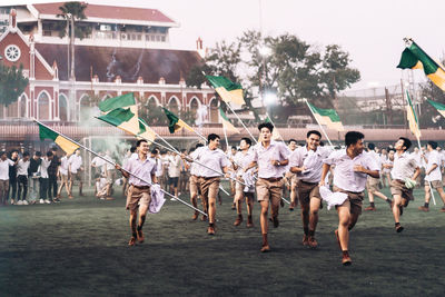 Group of people in front of building