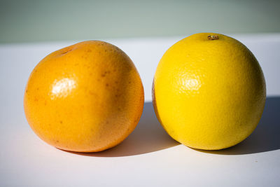 Close-up of oranges on table