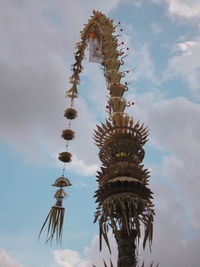 Low angle view of statue against sky