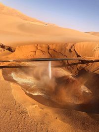 Scenic view of desert against sky