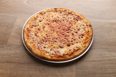 High angle view of pizza on table