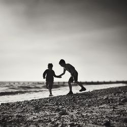 People walking on beach