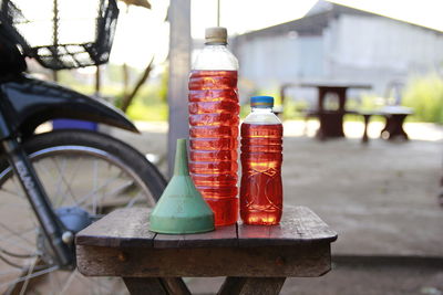 Close-up of wine bottles on table