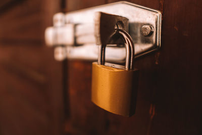 Close-up of padlock on door