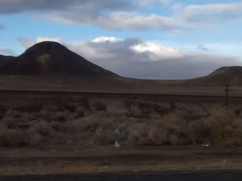 Scenic view of desert against sky