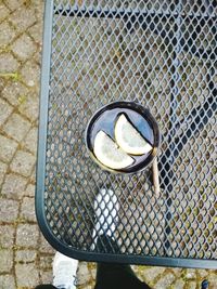 High angle view of drink on metallic table outdoors