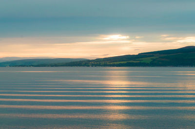 View of calm sea at sunset