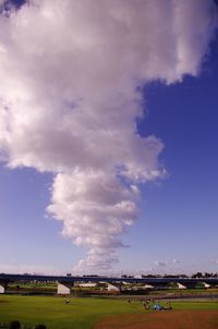 View of landscape against cloudy sky