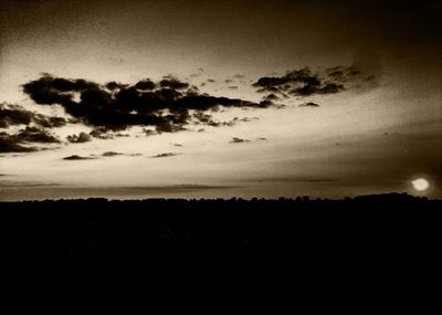 Silhouette of trees against sky during sunset