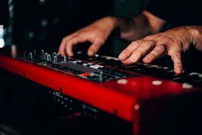 Cropped image of man playing guitar