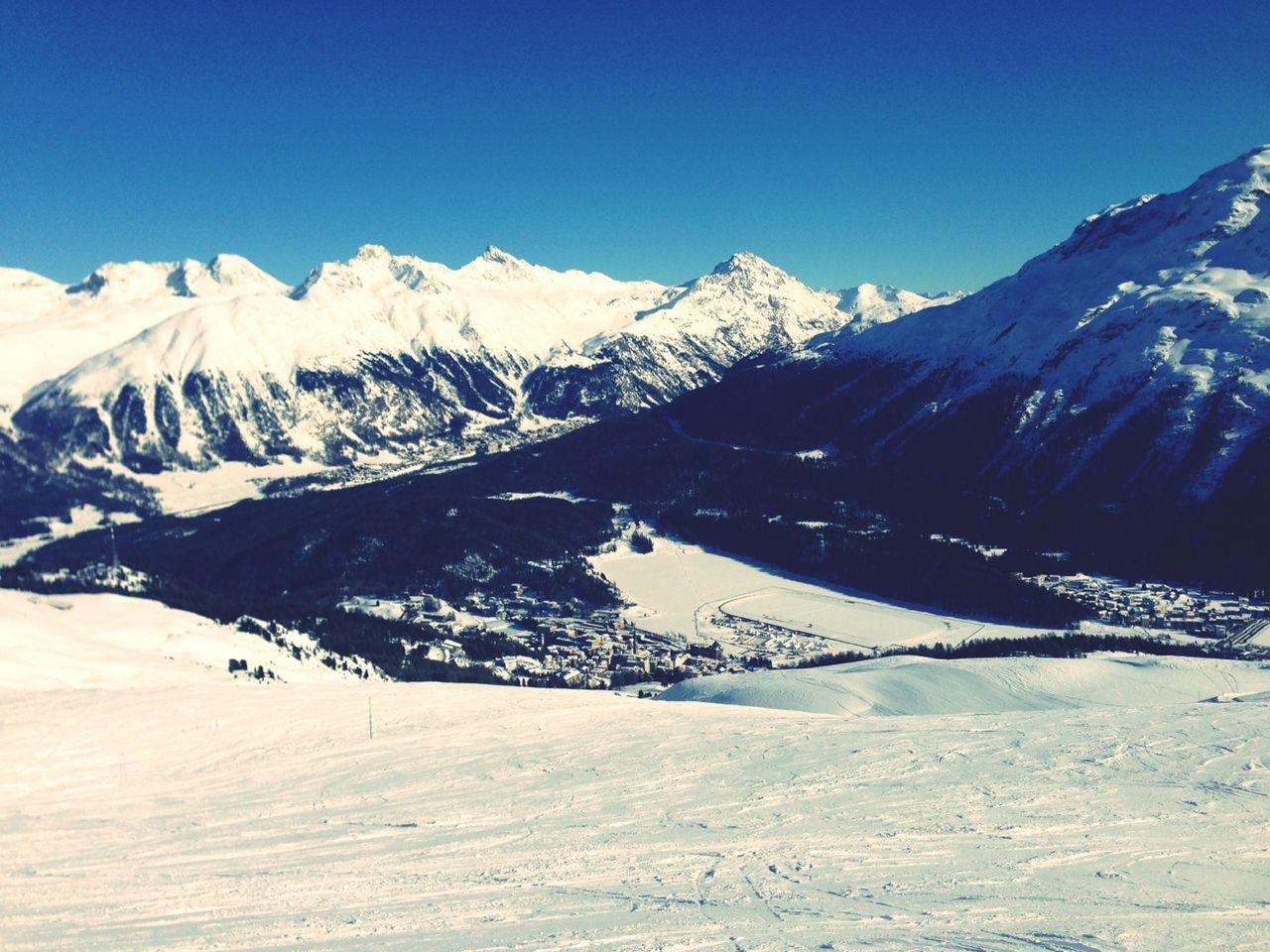 snow, winter, mountain, cold temperature, mountain range, snowcapped mountain, season, tranquil scene, tranquility, clear sky, scenics, beauty in nature, landscape, weather, nature, blue, covering, snowcapped, non-urban scene, copy space